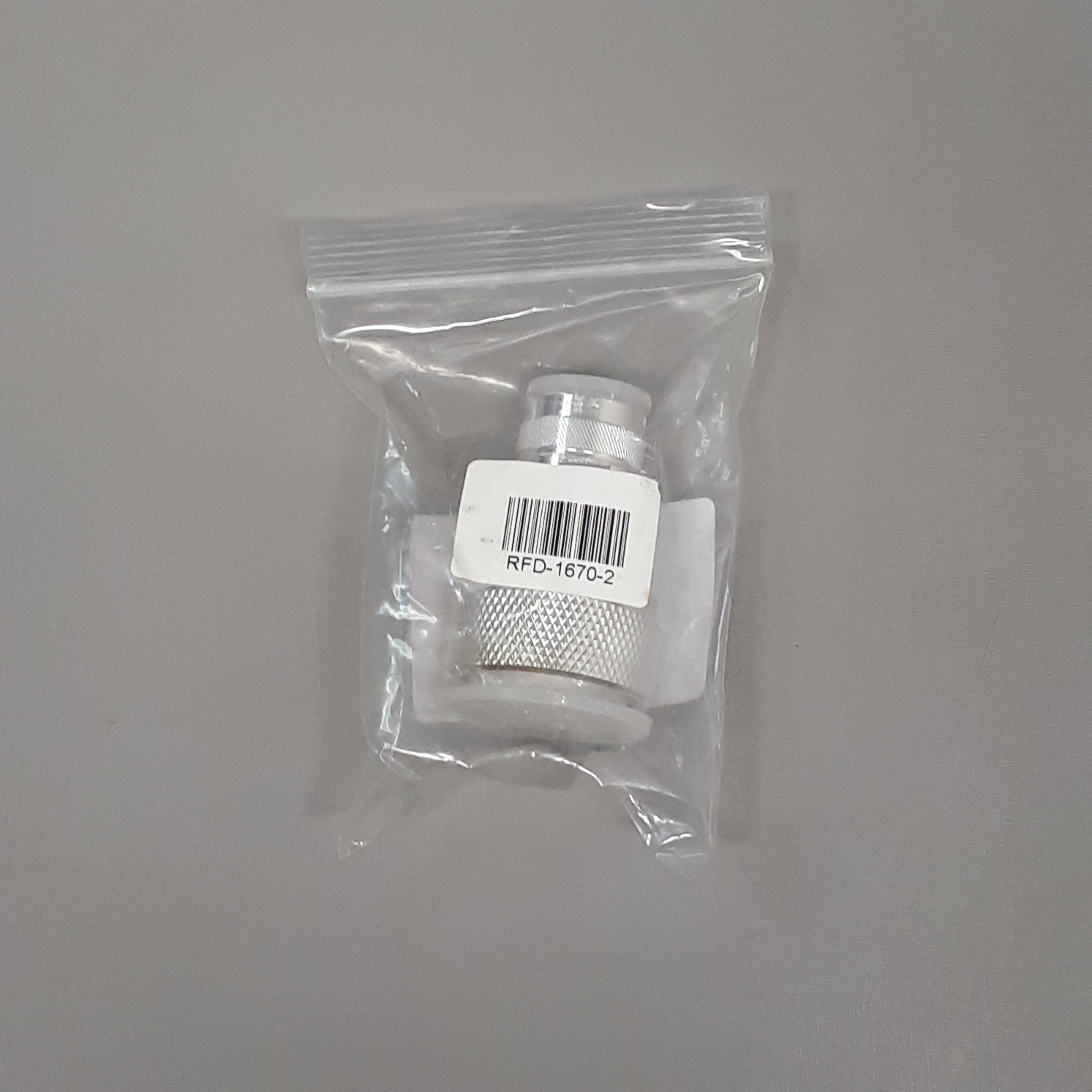 RF INDUSTRIES Coaxial Adapter, Low PIM, 7-16 DIN Male to N Male, Straight Barrel, 5500 MHz Frequency, Silver Body/Contact Plating, PTFE Dielectric (Lightly Discolored)