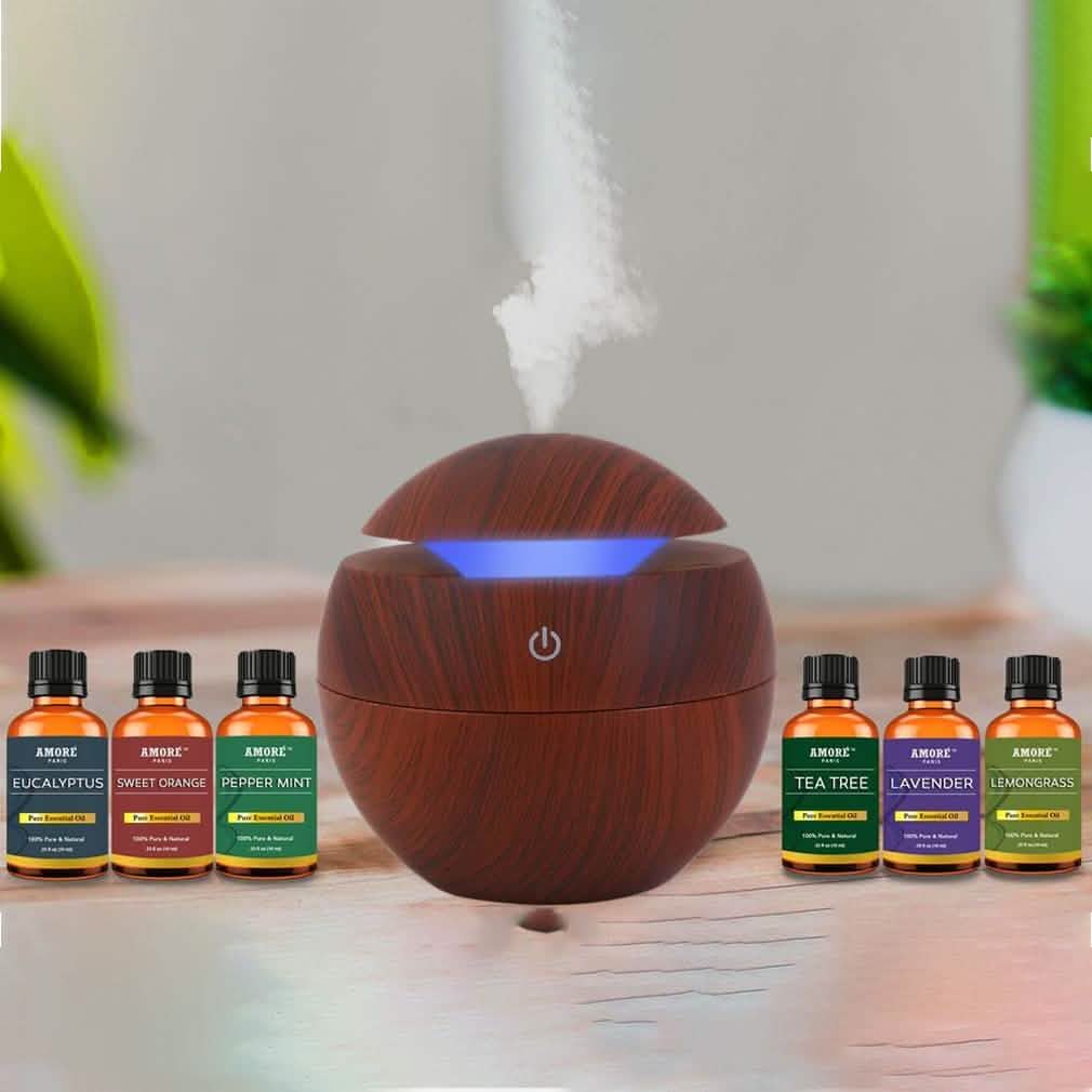 7-Piece: Ultrasonic Cool Mist Wood-Look Aroma Diffuser with Essential Oils