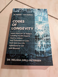 Codes of Longevity: Learn from 20+ of Today's Leading Health Experts How to Unlock Your Potential to Look, Feel and Live Life Optimized to 120 and Beyond by Melissa Grill-Petersen