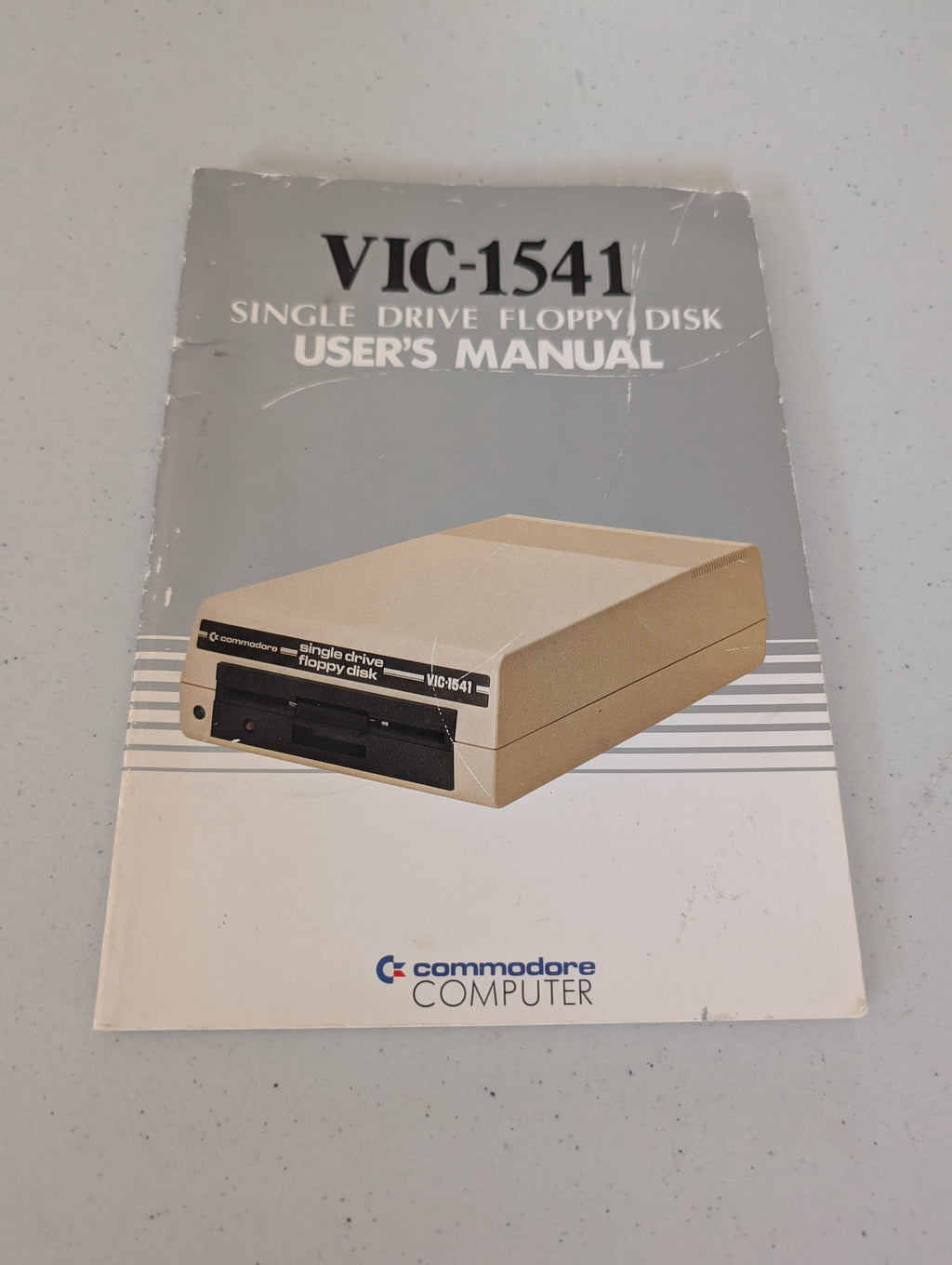 Commodore 1541 Floppy Disk Drive and manual