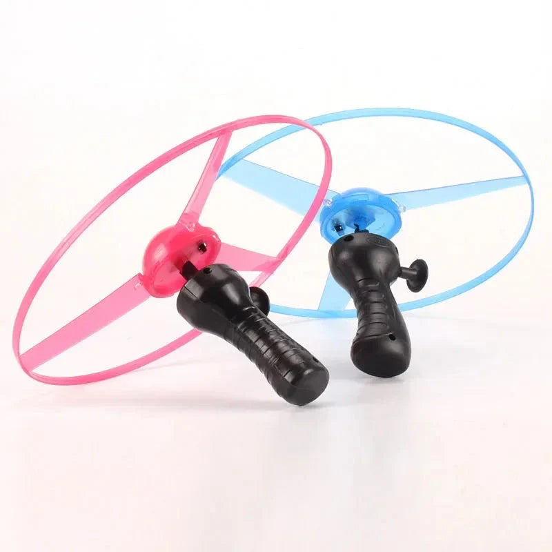 Pull Wire Glow UFO – Spinning LED Flyer Toy for Kids Outdoor Fun