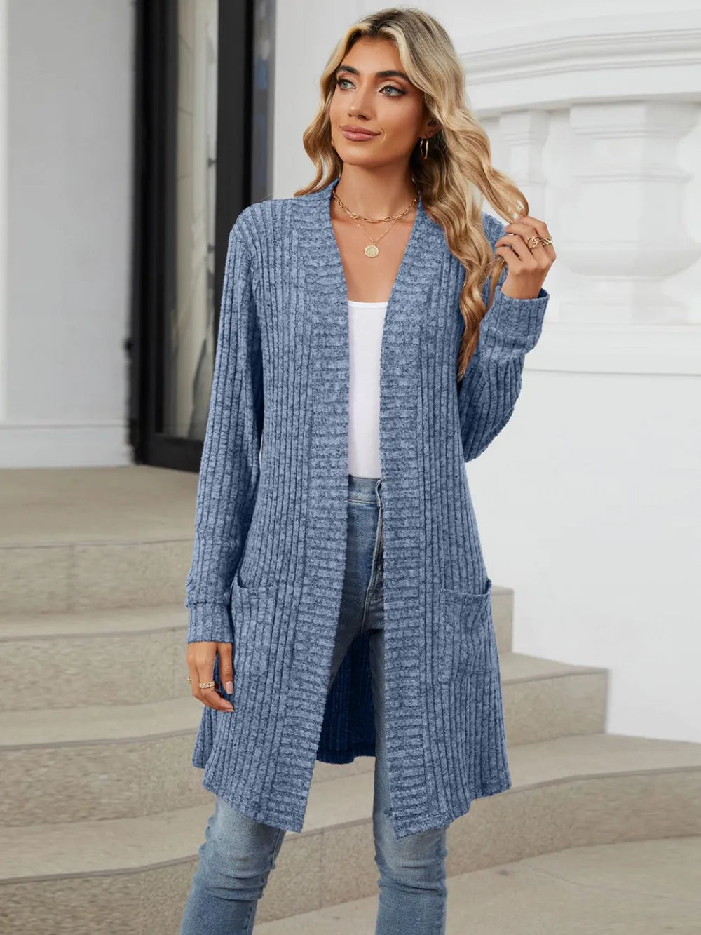 Autumn and winter long color long sleeved loose pocket cardigan jacket for women