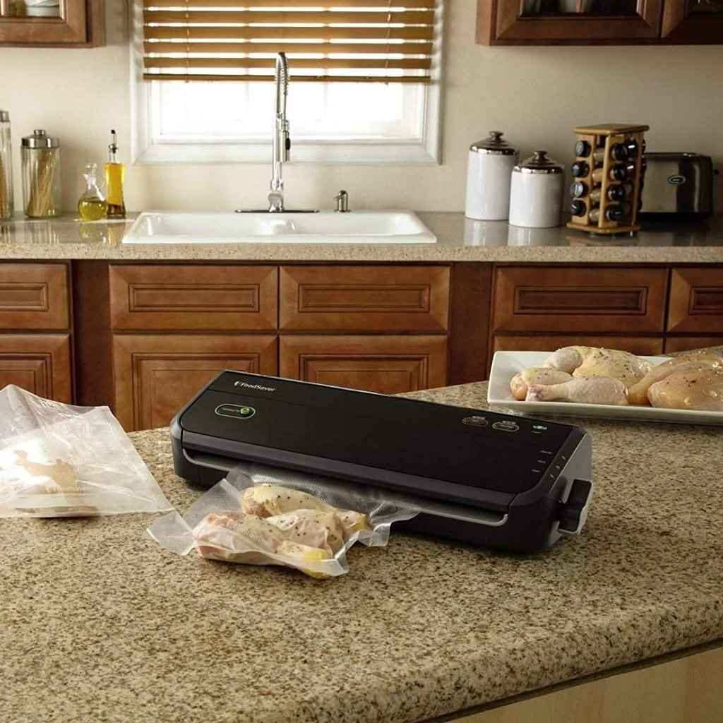FoodSaver Vacuum Sealer System with Starter Bags & Rolls