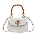 Handheld bamboo bag women's shoulder bag retro saddle bag