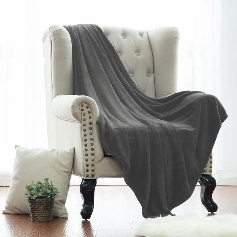 Kathy Ireland Flannel Solid Microplush Bed Blankets