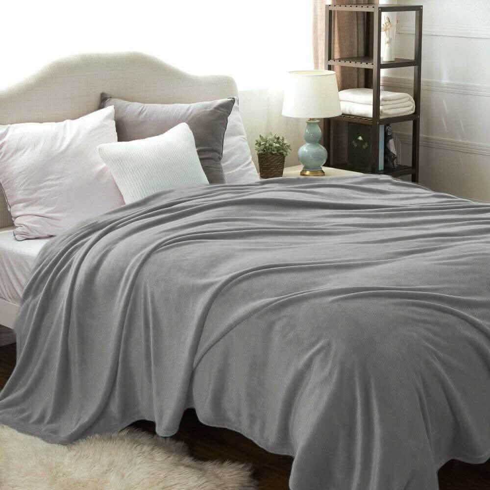 Kathy Ireland Flannel Solid Microplush Bed Blankets