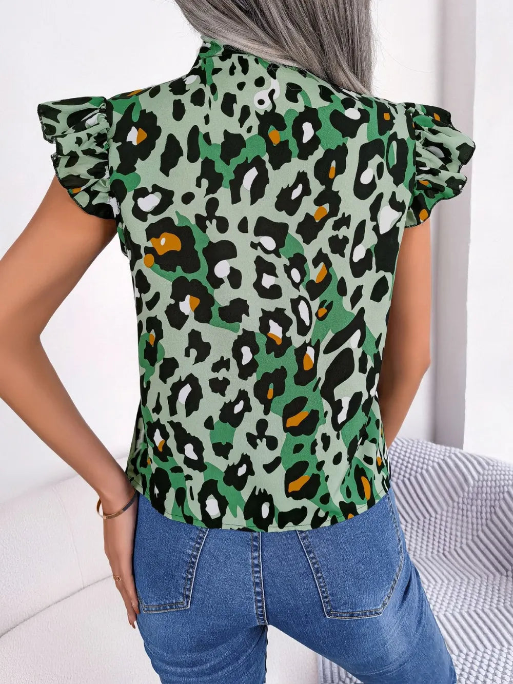 Leopard Tie Neck Cap Sleeve Blouse