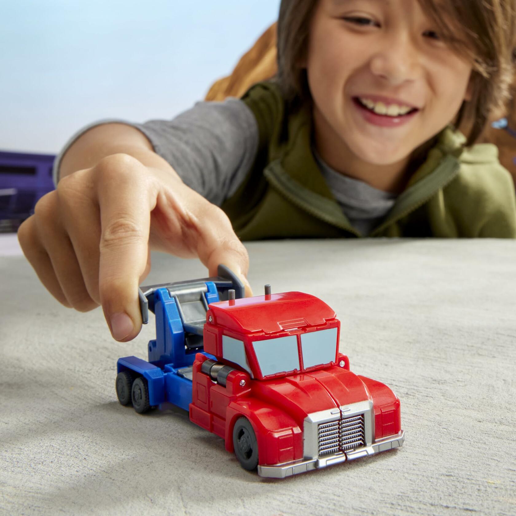 Transformers EarthSpark 1-Step Smash Changers Optimus Prime 4-Inch Action Figure