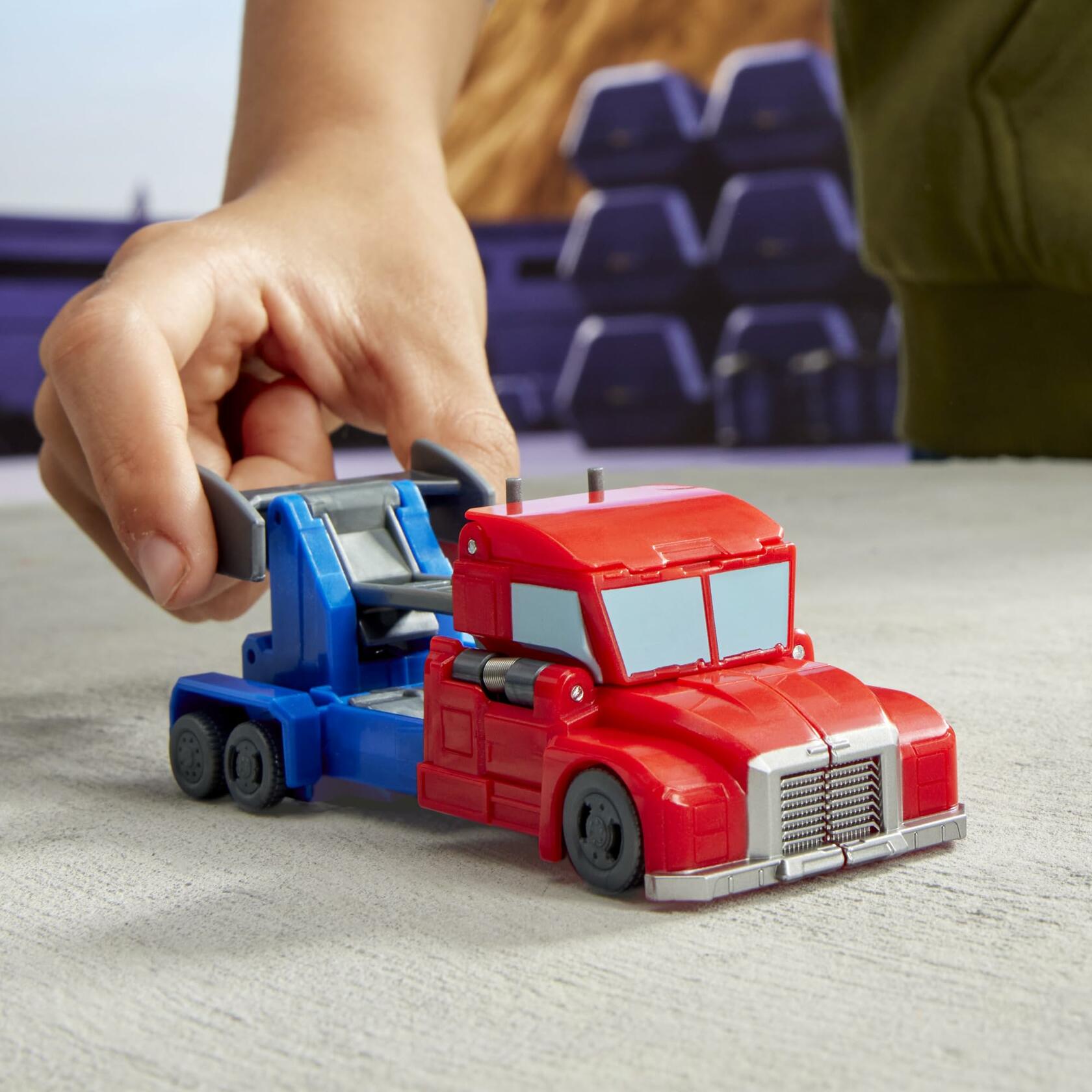 Transformers EarthSpark 1-Step Smash Changers Optimus Prime 4-Inch Action Figure