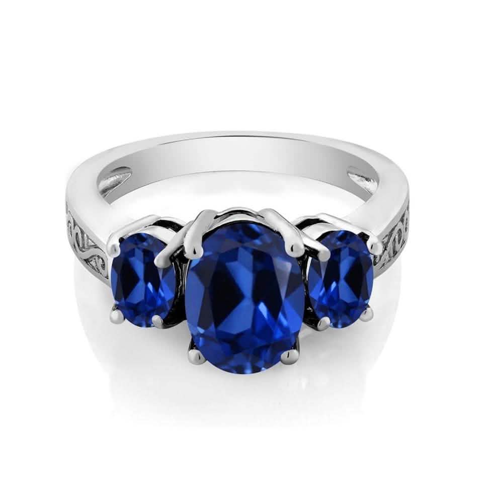 Oval Cut Tri Stone Blue Topaz Ring - Assorted Sizes