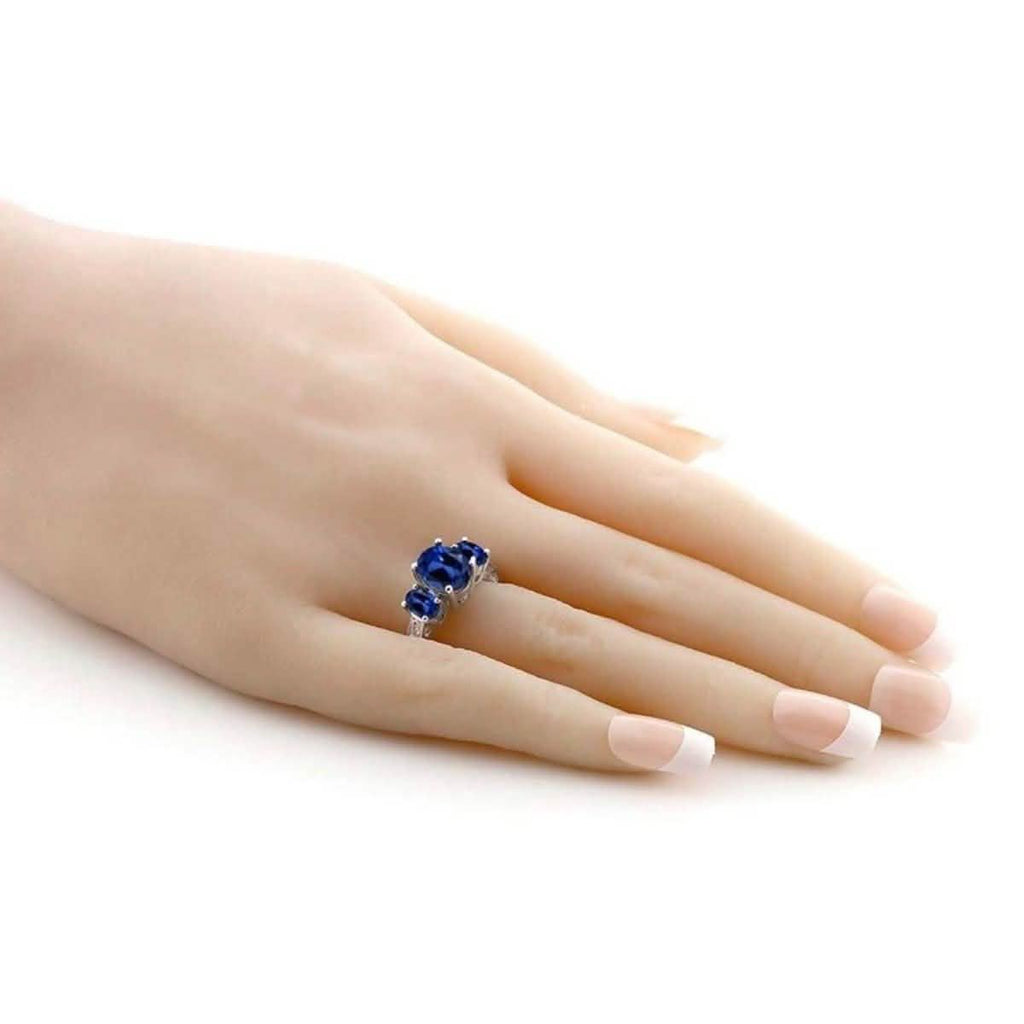 Oval Cut Tri Stone Blue Topaz Ring - Assorted Sizes