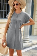 Spring and summer new round neck solid color short sleeved loose dress for women