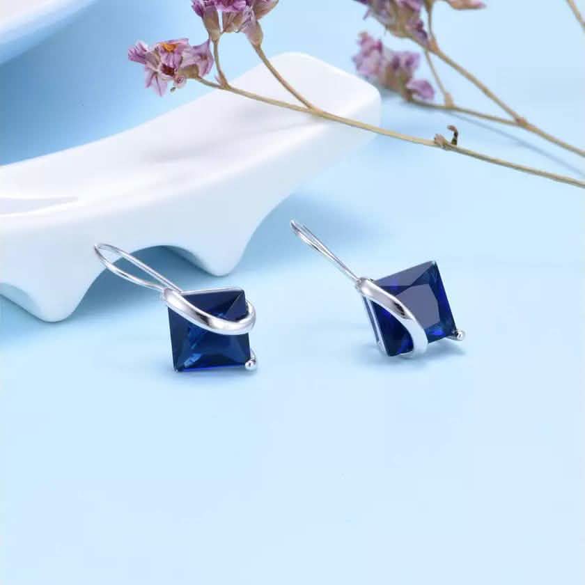 Sterling Silver Sapphire Diamond Cut Earring
