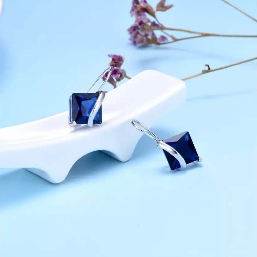 Sterling Silver Sapphire Diamond Cut Earring